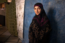 Líbano: impacto social de la guerra y opciones de reajuste institucional 40-year-old Hoda Zaher poses for the camera in the room of a