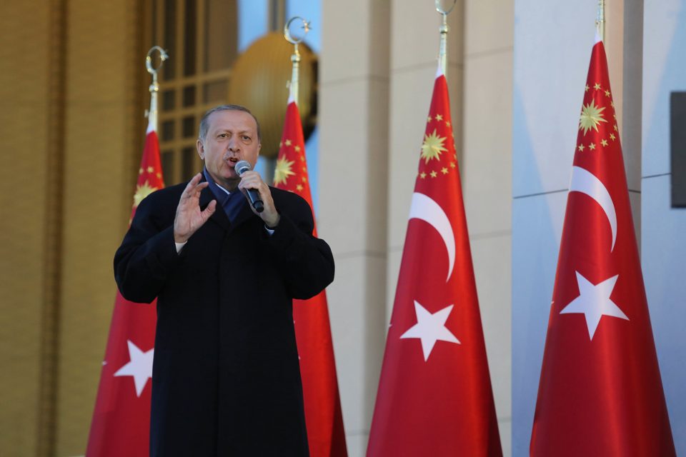 ANKARA, TURKEY - APRIL 17: Turkish President Tayyip Erdogan gives a referendum victory speech to his supporters at the Presidential Palace on April 17, 2017 in Ankara Turkey. Erdogan declared victory in Sunday's historic referendum that will grant sweeping powers to the presidency, hailing the result as a "historic decision. 51.4 per cent per cent of voters had sided with the "Yes" campaign, ushering in the most radical change to the country's political system in modern times.Turkey's main opposition calls on top election board to annul the referendum. OSCE observers said that a Turkish electoral board decision to allow as valid ballots that did not bear official stamps undermined important safeguards against fraud. (Photo by Elif Sogut/Getty Images)
